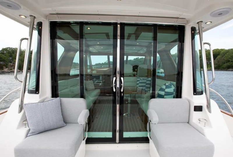 Slide: The Image of 2026 Sabre 43 Salon Express yacht with elegant interior and comfortable seating. - 2