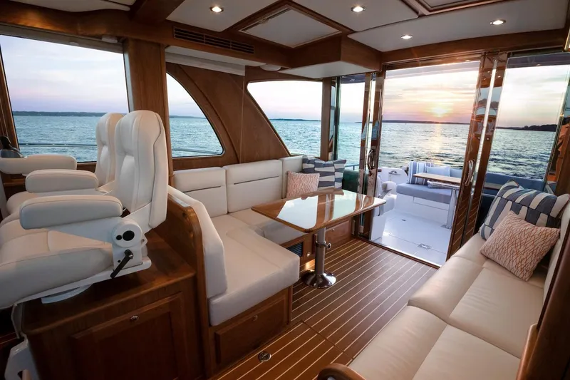Slide: The Image of Luxurious interior of 2026 Sabre 43 Salon Express yacht with sunset view. - 6