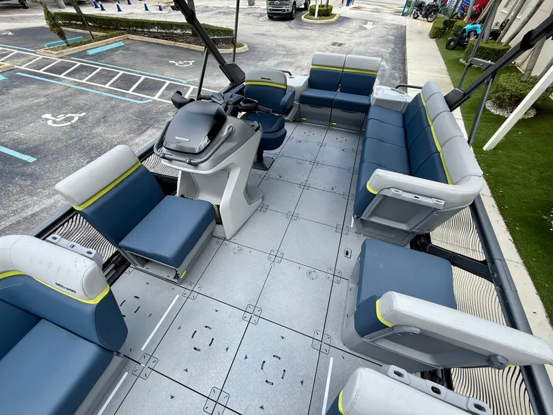 Slide: The Image of 2025 Sea-Doo Switch Cruise Limited 21 pontoon boat interior with spacious seating and modern design. - 9