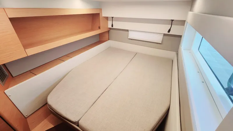 Slide: The Image of Cabin interior of 2017 Nautitech 46 Fly with bed and window view. - 10