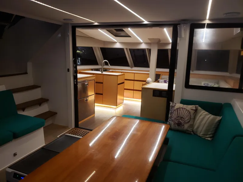 Slide: The Image of Luxurious interior of 2017 Nautitech 46 Fly catamaran with modern kitchen and seating area. - 26