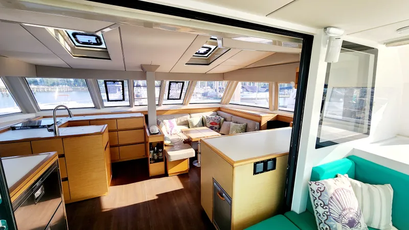 Slide: The Image of Luxurious interior of 2017 Nautitech 46 Fly catamaran with modern kitchen and cozy seating area. - 27