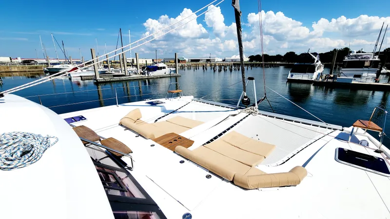 Slide: The Image of Luxurious Nautitech 46 Fly catamaran, 2017 model, docked at marina with clear blue skies. - 38