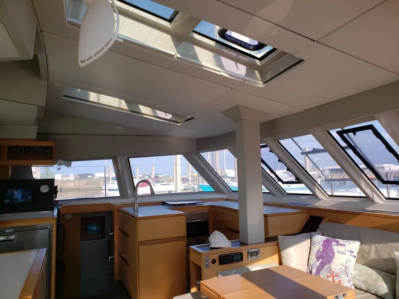 Slide: The Image of Interior of 2017 Nautitech 46 Fly catamaran with skylights and modern furnishings. - 4