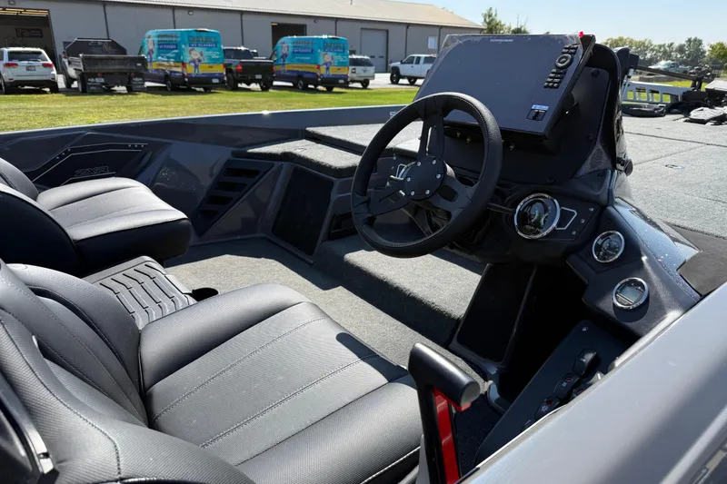 Slide: The Image of Interior of 2025 Skeeter ZXR21 boat with modern steering and seating. - 11