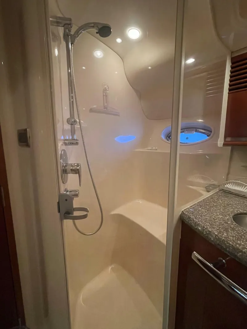Slide: The Image of Luxurious shower area in 2005 Sea Ray 500 Sundancer yacht with modern fixtures. - 15