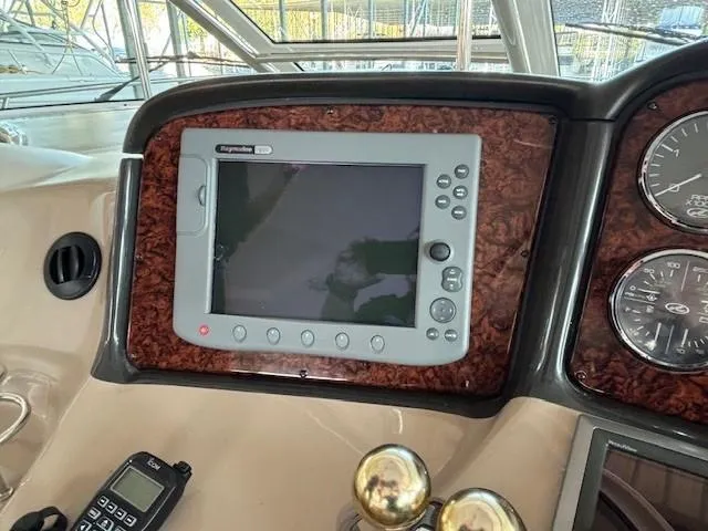 Slide: The Image of Control panel of a 2005 Sea Ray 500 Sundancer yacht with navigation display. - 22