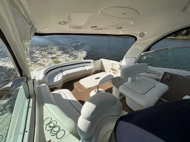 Slide: The Image of Luxurious 2005 Sea Ray 500 Sundancer yacht interior with plush seating on open water. - 42