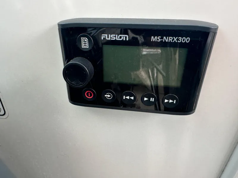 Slide: The Image of Fusion MS-NRX300 marine stereo control on a 2003 Tiara Yachts 3100 Open. - 12