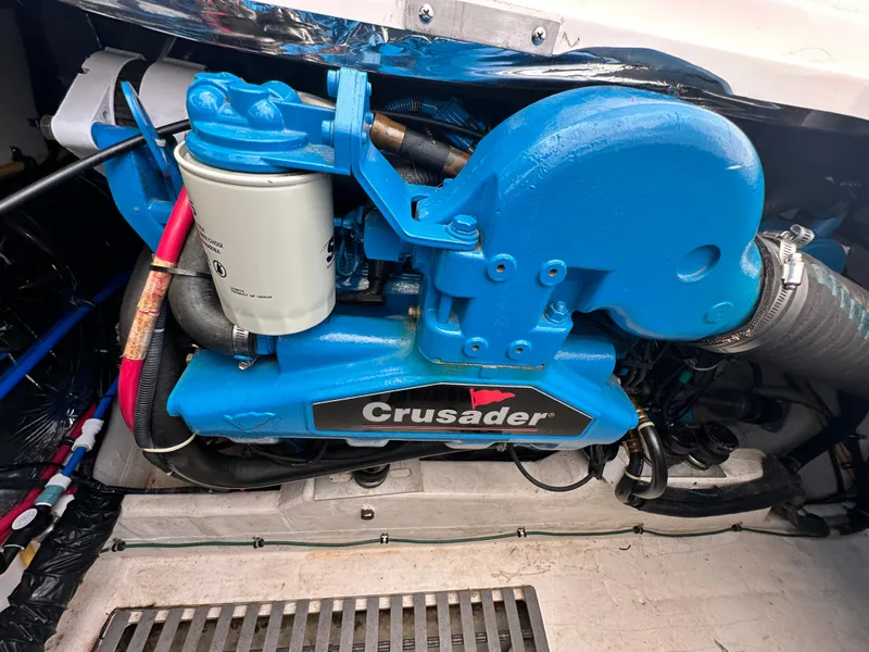 Slide: The Image of Engine compartment of a 2003 Tiara Yachts 3100 Open with a blue Crusader engine. - 34
