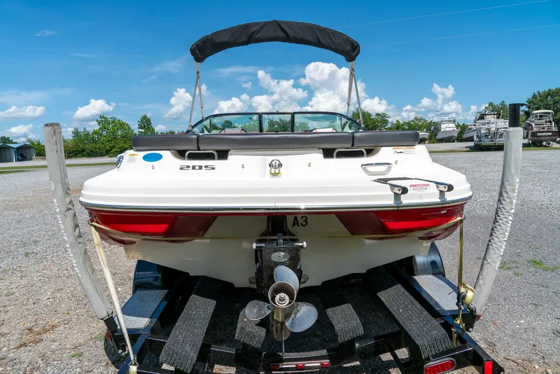 Slide: The Image of 2014 Sea Ray 205 Sport boat on trailer, rear view, sunny day. - 7