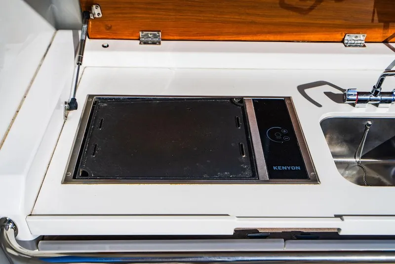 Slide: The Image of Kenyon grill and sink on 2016 Beneteau GRAN TURISMO 49 yacht. - 27