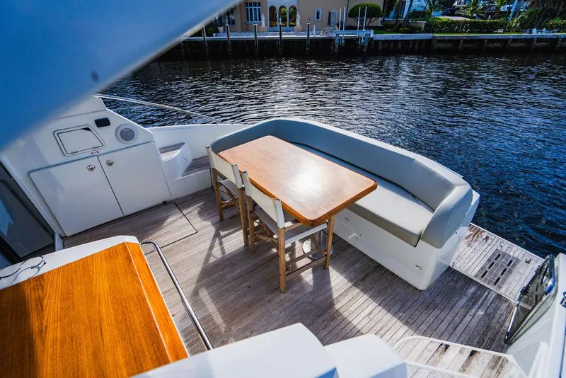 Slide: The Image of Beneteau Gran Turismo 49 yacht deck with seating and table, 2016 model. - 32