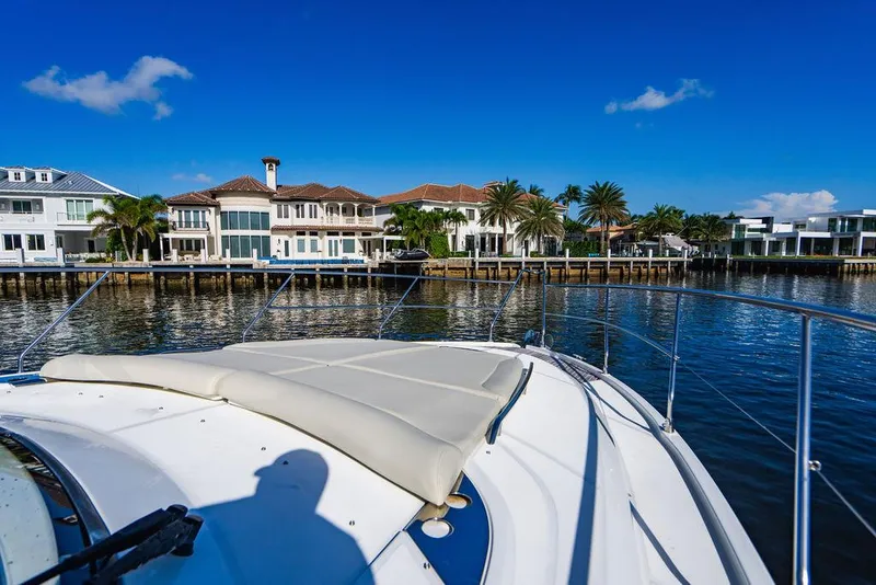 Slide: The Image of Beneteau GRAN TURISMO 49 yacht cruising near waterfront homes, 2016 model. - 37