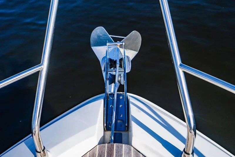 Slide: The Image of Beneteau Gran Turismo 49 bow with anchor, 2016 model, on calm water. - 38