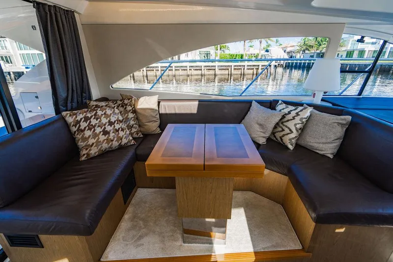 Slide: The Image of Luxurious interior of 2016 Beneteau Gran Turismo 49 yacht with plush seating and elegant decor. - 46