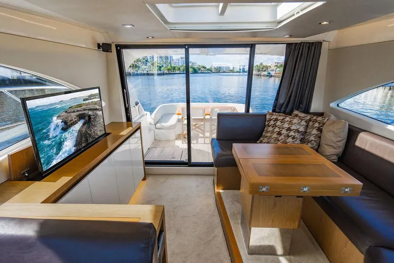 Slide: The Image of Luxurious interior of 2016 Beneteau Gran Turismo 49 yacht with scenic water view. - 48