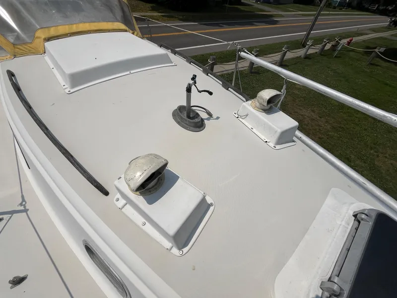 Slide: The Image of Deck of a 1980 Pearson 30 sailboat with ventilation hatches. - 18
