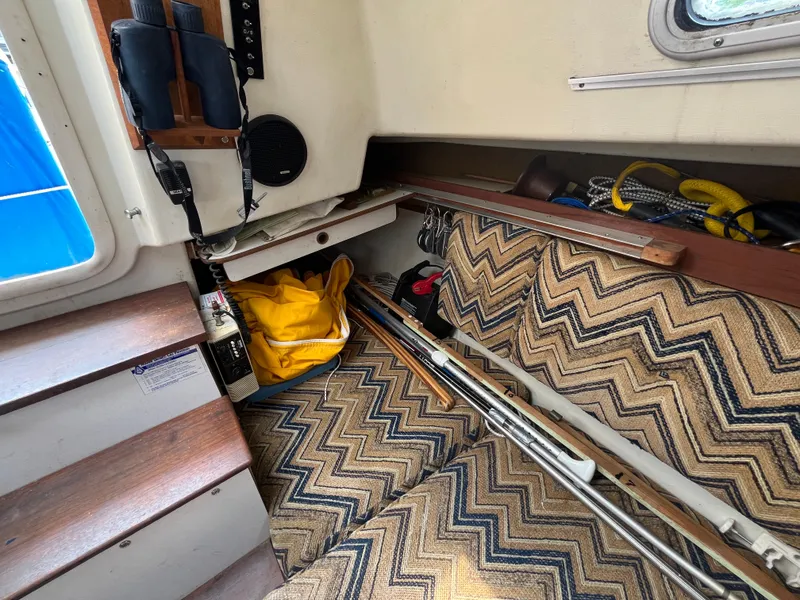 Slide: The Image of Interior of a 1980 Pearson 30 yacht with storage and equipment. - 28