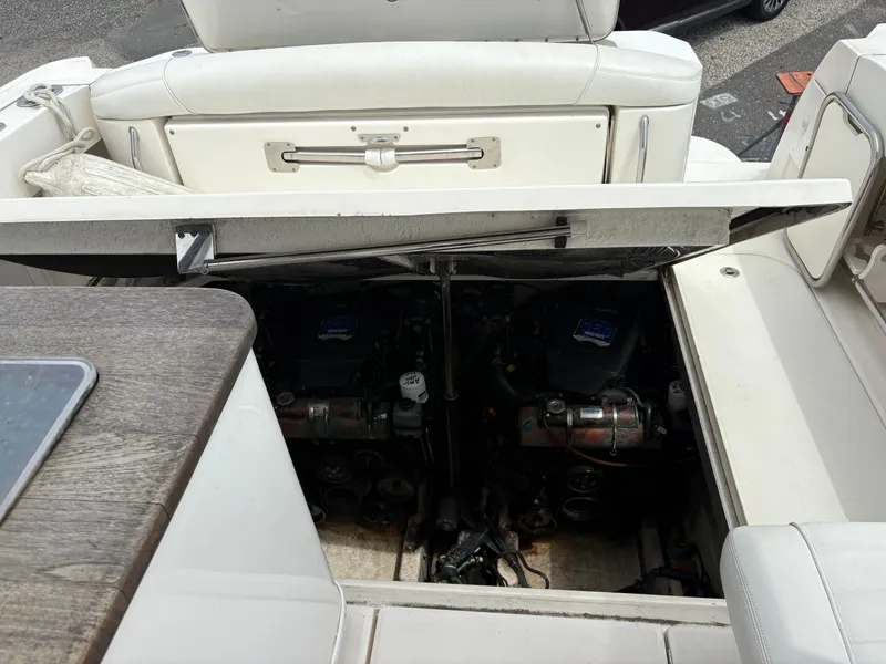 Slide: The Image of 2008 Sea Ray 290 Amberjack boat engine compartment with open hatch. - 29
