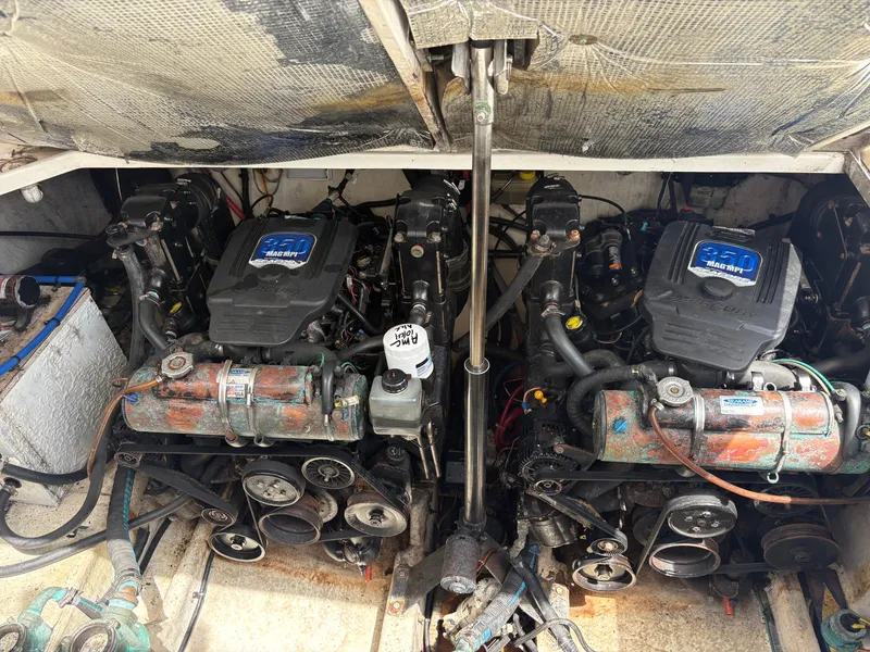 Slide: The Image of Engine compartment of a 2008 Sea Ray 290 Amberjack with twin 350 Mag MPI engines. - 30
