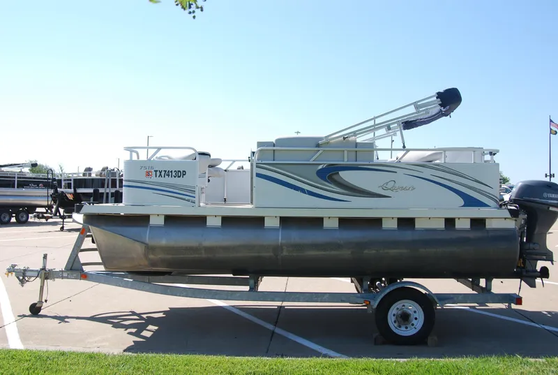 Slide: The Image of 2016 Apex Marine QUEST 7516 pontoon boat on trailer in parking lot. - 3