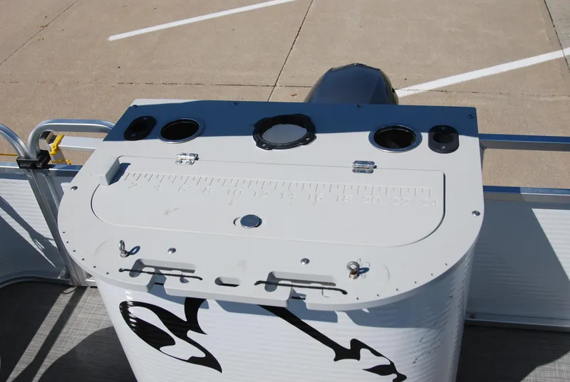 Slide: The Image of 2016 Apex Marine QUEST 7516 boat console with measurement markings and cup holders. - 5