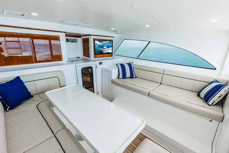 Slide: The Image of Luxurious interior of 2020 Viking 46 Billfish yacht with elegant seating and ocean view. - 10
