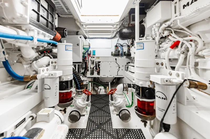 Slide: The Image of Engine room of 2020 Viking 46 Billfish, showcasing advanced marine machinery and components. - 24