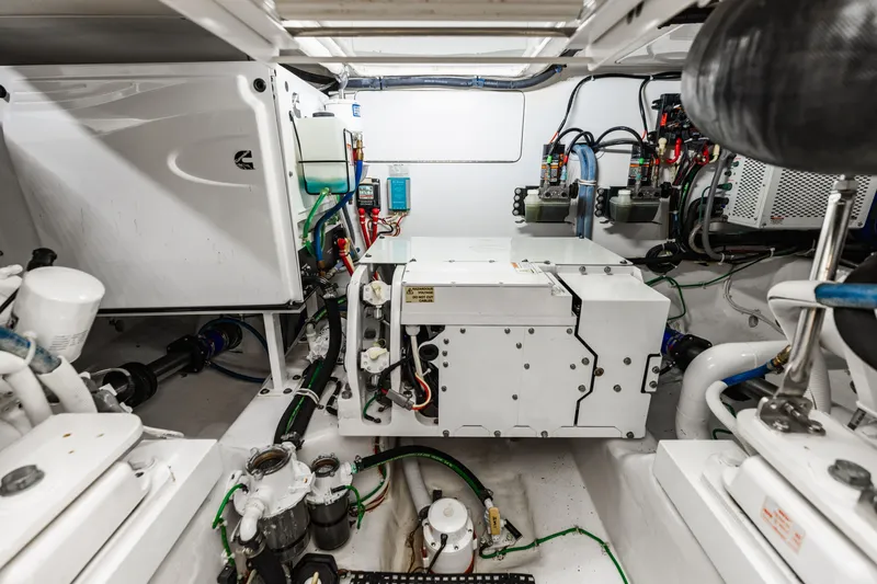 Slide: The Image of Engine room of 2020 Viking 46 Billfish yacht, showcasing advanced machinery and equipment. - 25