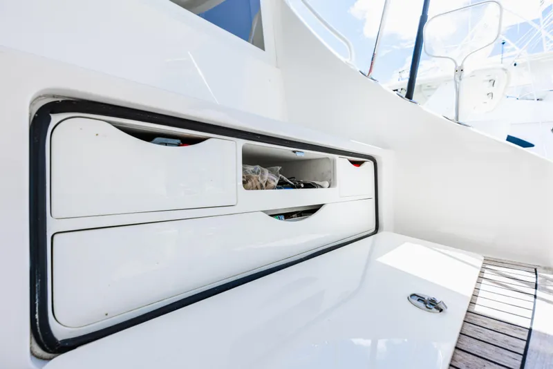 Slide: The Image of Storage compartment on 2020 Viking 46 Billfish boat deck. - 27