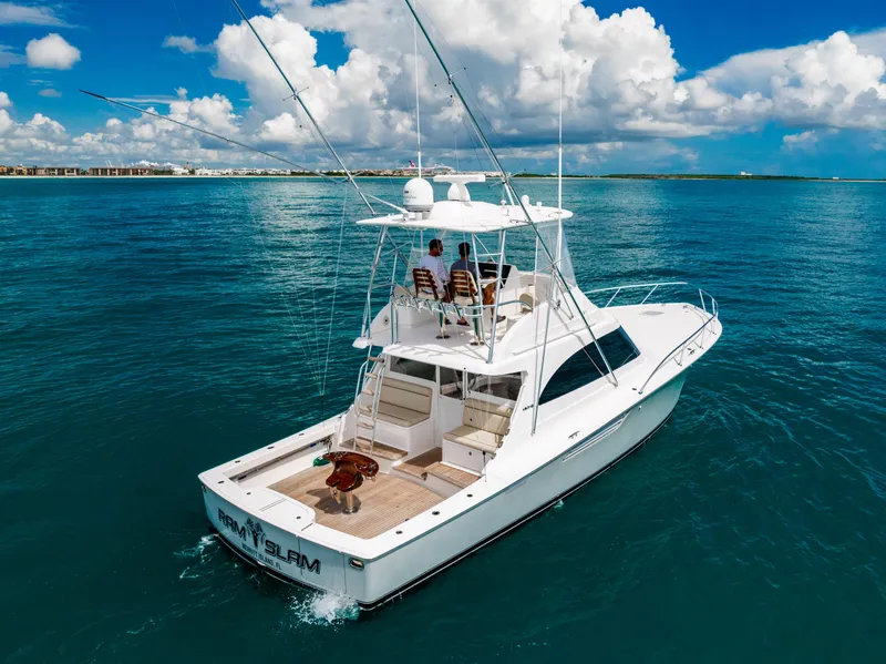 Slide: The Image of 2020 Viking 46 Billfish yacht cruising on clear blue ocean waters. - 3