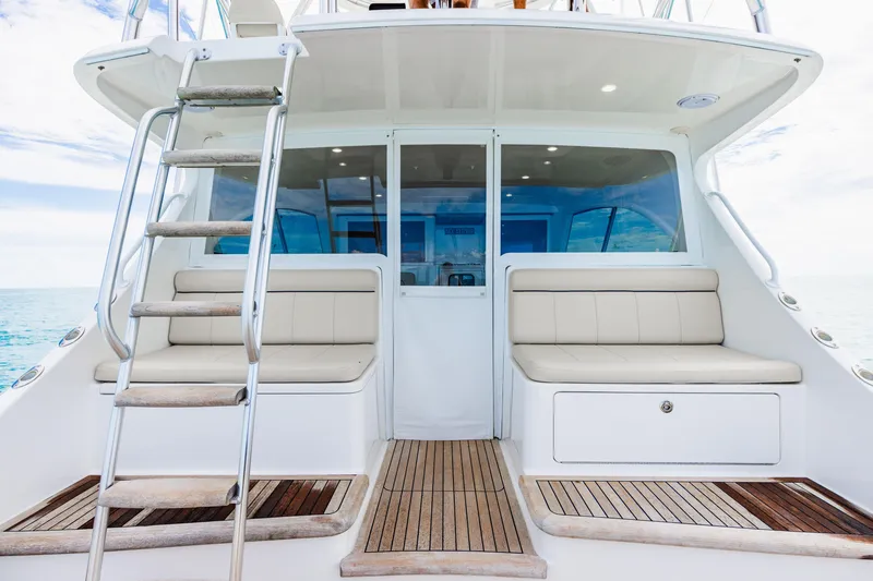Slide: The Image of 2020 Viking 46 Billfish yacht with seating and ladder, ocean view. - 6