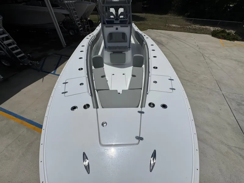 Slide: The Image of 2026 Cape Horn 34 XS boat, top view, showcasing spacious deck and seating area. - 24