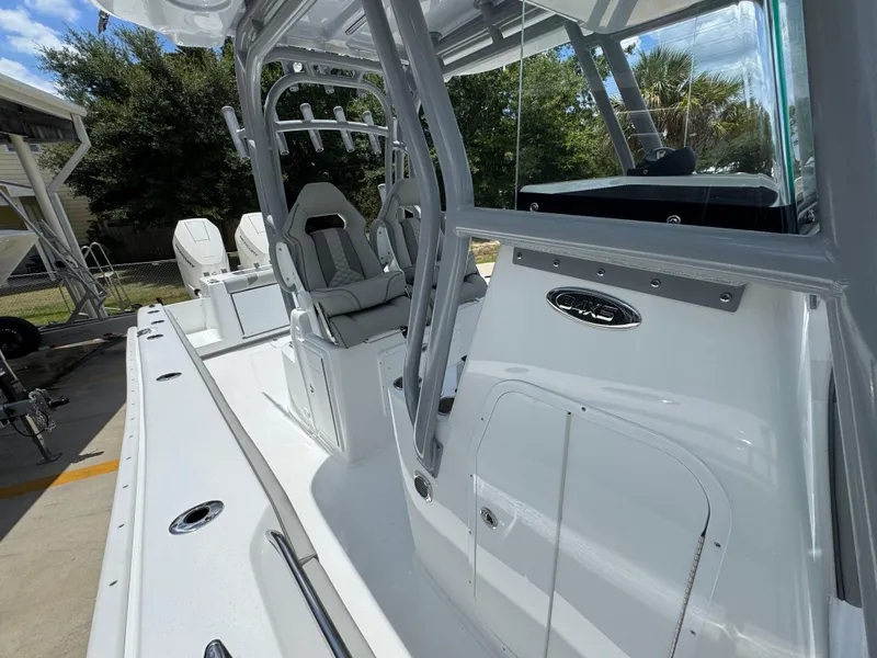 Slide: The Image of 2026 Cape Horn 34 XS boat interior with seating and console, showcasing sleek design and functionality. - 28