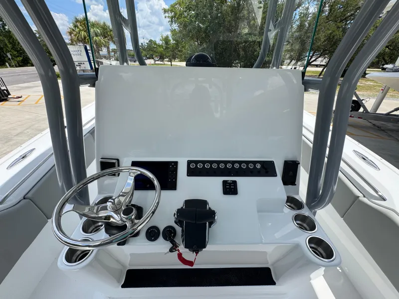 Slide: The Image of 2026 Cape Horn 34 XS boat console with steering wheel and control panel. - 31