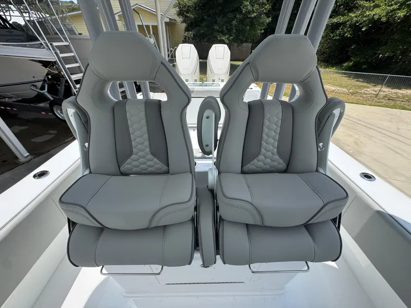 Slide: The Image of 2026 Cape Horn 34 XS boat seats, featuring sleek gray upholstery and modern design. - 34