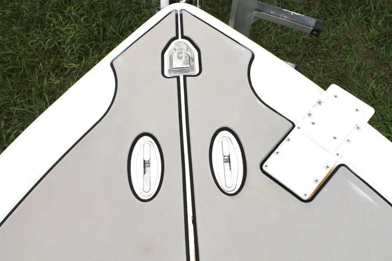 Slide: The Image of 2005 Yellowfin 31 Open boat with dual Suzuki outboard engines on a trailer. - 10