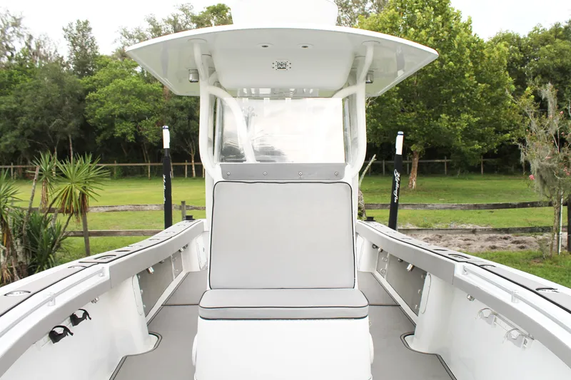 Slide: The Image of Twin 300 horsepower engines on a 2005 Yellowfin 31 Open boat. - 14