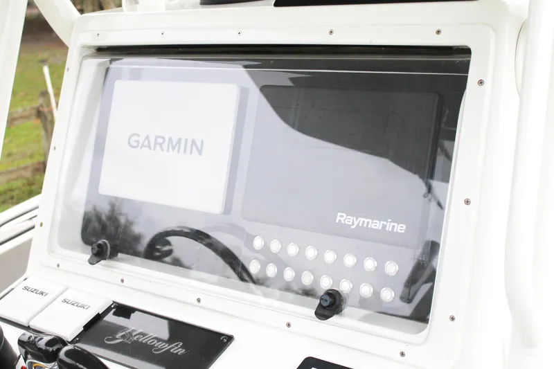 Slide: The Image of 2005 Yellowfin 31 Open boat interior with sleek seating and modern design. - 20