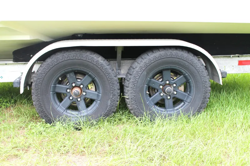 Slide: The Image of Speakers on a 2005 Yellowfin 31 Open boat, featuring JL Audio components. - 31