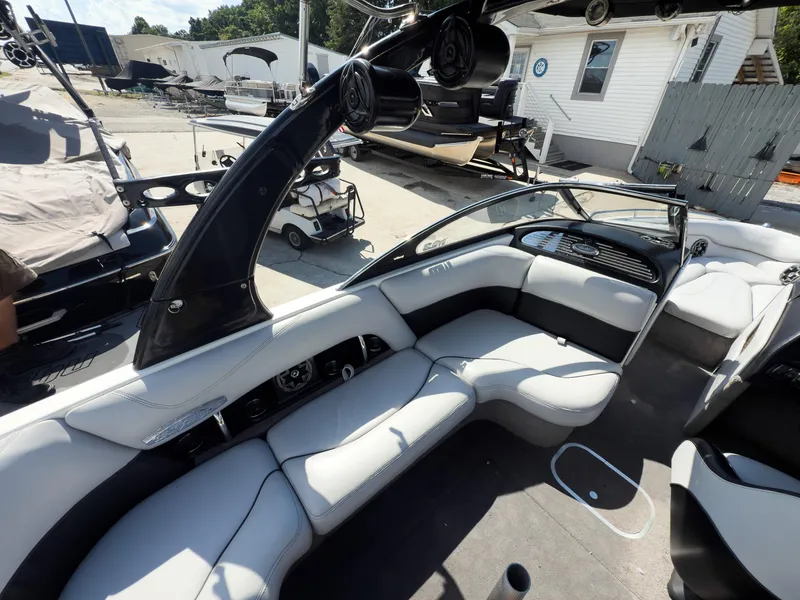Slide: The Image of 2006 Malibu 23 VLX boat interior with sleek seating and modern design. - 9