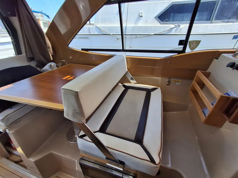 Slide: The Image of Interior of 2017 Cutwater C24 boat with seating and table. - 13