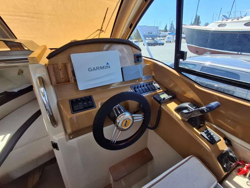 Slide: The Image of Interior helm of 2017 Cutwater C24 boat with Garmin navigation system. - 20
