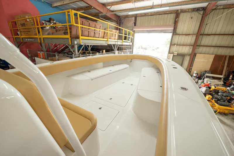 Slide: The Image of 2020 Bahama 41 Open Fisherman boat interior in a warehouse. - 7