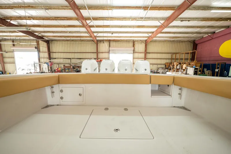 Slide: The Image of 2020 Bahama 41 Open Fisherman boat interior in a warehouse. - 8
