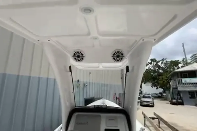 Slide: The Image of 2023 Airship 310-Rib boat interior with control panel and steering wheel. - 21