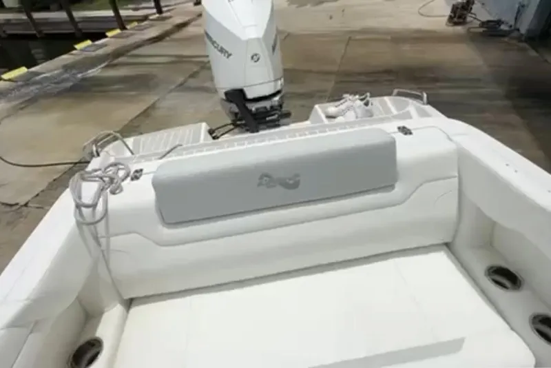 Slide: The Image of 2023 Airship 310-Rib boat interior with control panel and docked setting. - 22