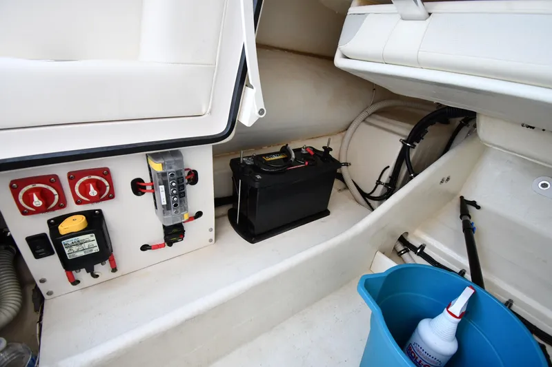 Slide: The Image of Interior of 2023 Airship 310-Rib boat showing battery and control panel. - 31