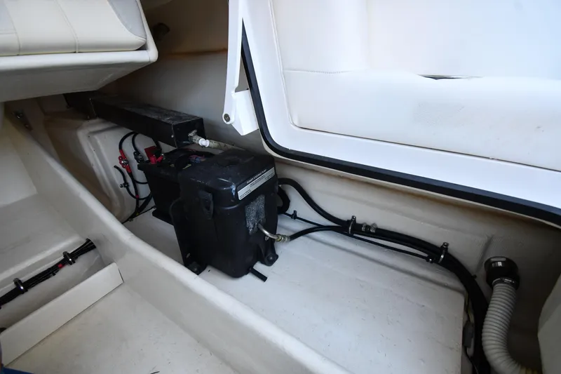 Slide: The Image of Interior view of 2023 Airship 310-Rib boat showing battery and wiring setup. - 32